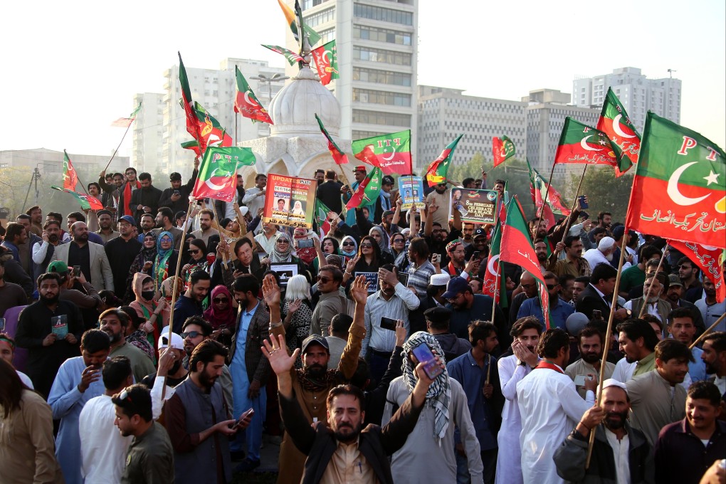Supporters of former Pakistan prime minister Imran Khan, take part in a rally to commemorate the first anniversary of general elections, in Karachi, Pakistan, on February 8. Photo: EPA-EFE
