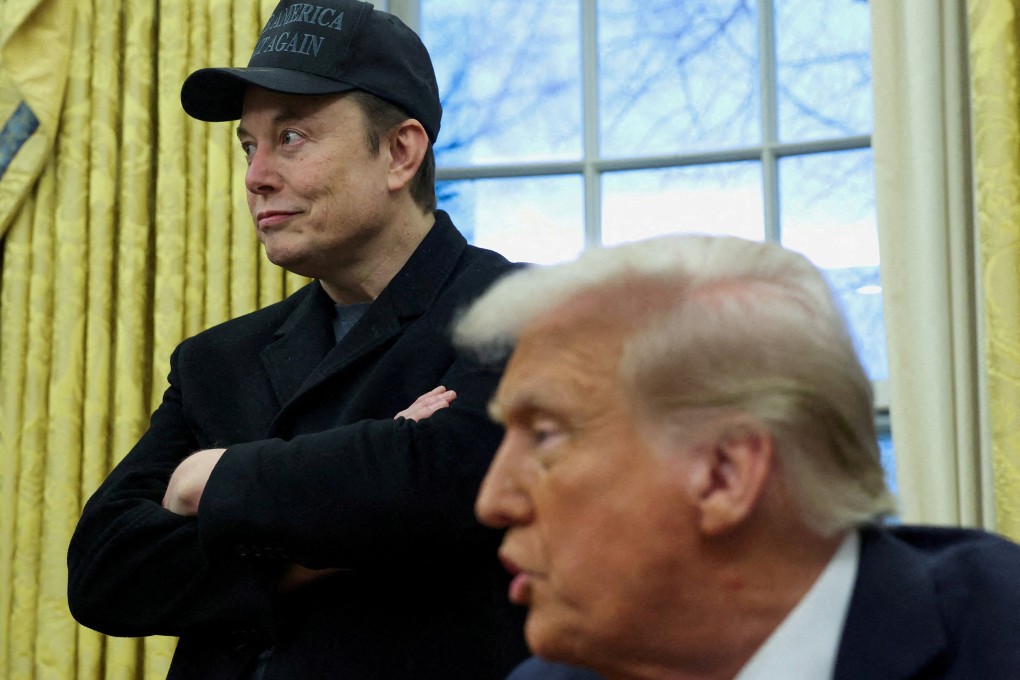 Elon Musk (left) listens to US President Donald Trump speak in the Oval Office on February 11. Photo: Reuters