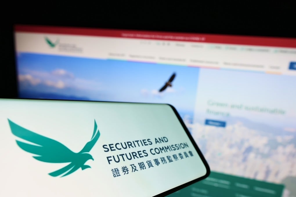 A cellphone showing the logo od Hong Kong’s Securities and Futures Commission. Photo: Shutterstock
