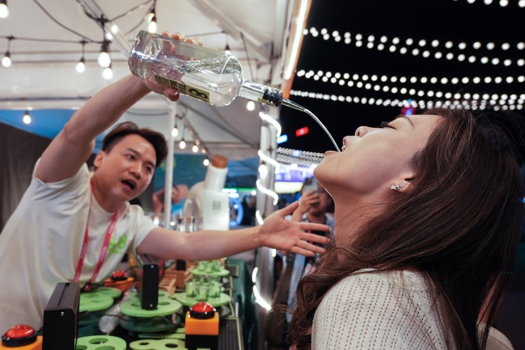 Visitors take part in a drinking competition at the Wine & Dine Festival in Hong Kong in 2024. Discover why one writer has chosen a sober lifestyle, and why a ruler in ancient China decreed the death penalty for people caught drinking. Photo: Eugene Lee