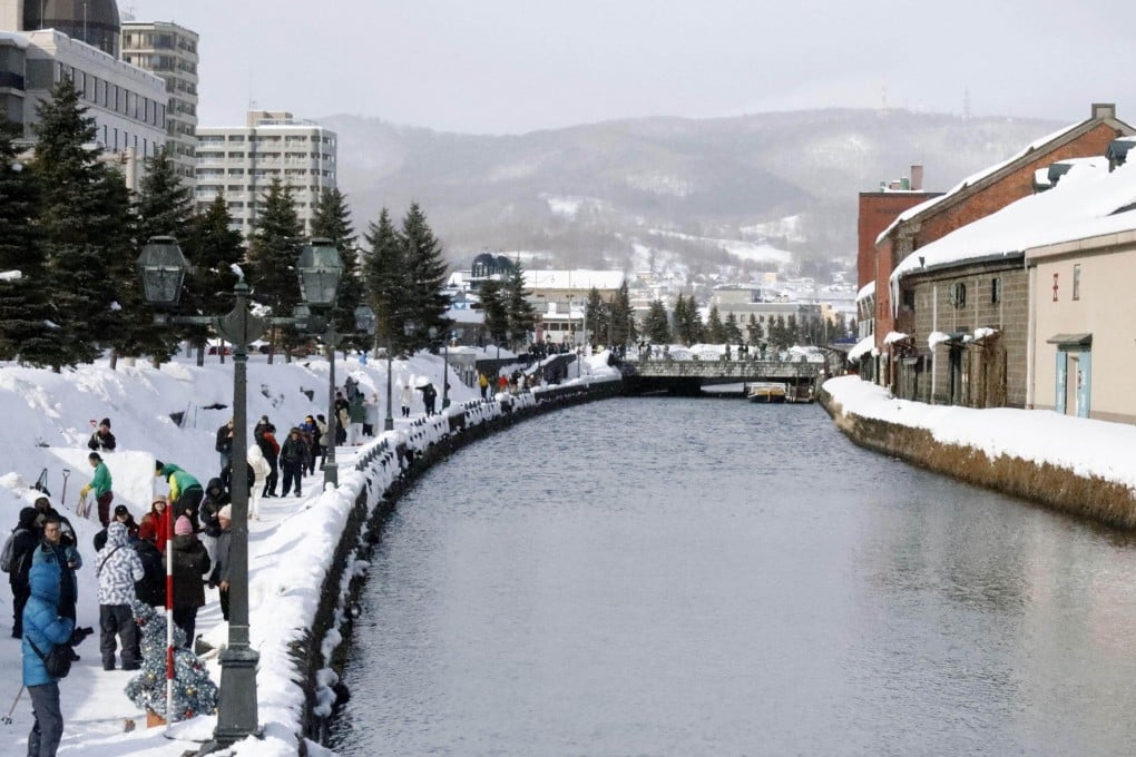People visit Otaru Canal, a popular tourist spot, in Otaru, Hokkaido, northern Japan, on February 4. Photo: Kyodo