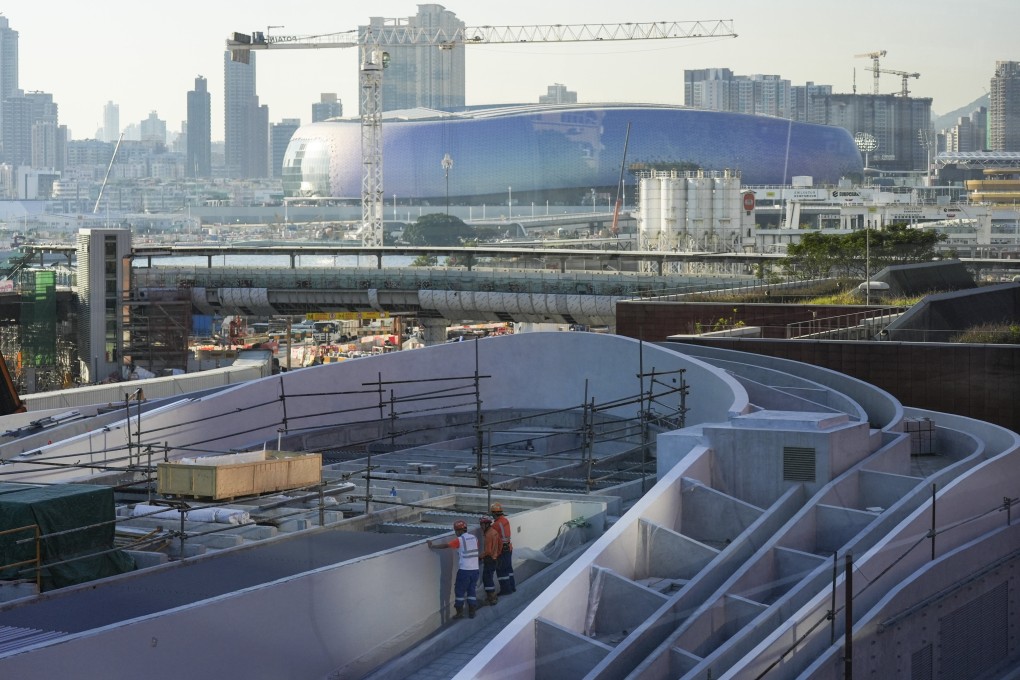 Workers at a construction site in Kai Tak. Photo: Eugene Lee