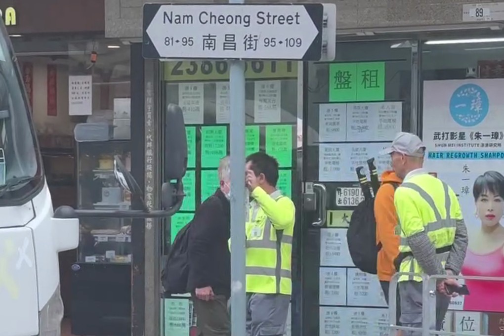 The workers were filmed putting fliers on signposts and then removing them later. Photo: Handout