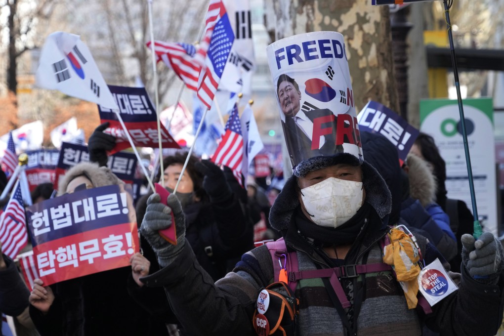A supporter of Yoon Suk-yeol attends a rally to oppose his impeachment near the Constitutional Court in Seoul, South Korea, on February 20. Photo: AP