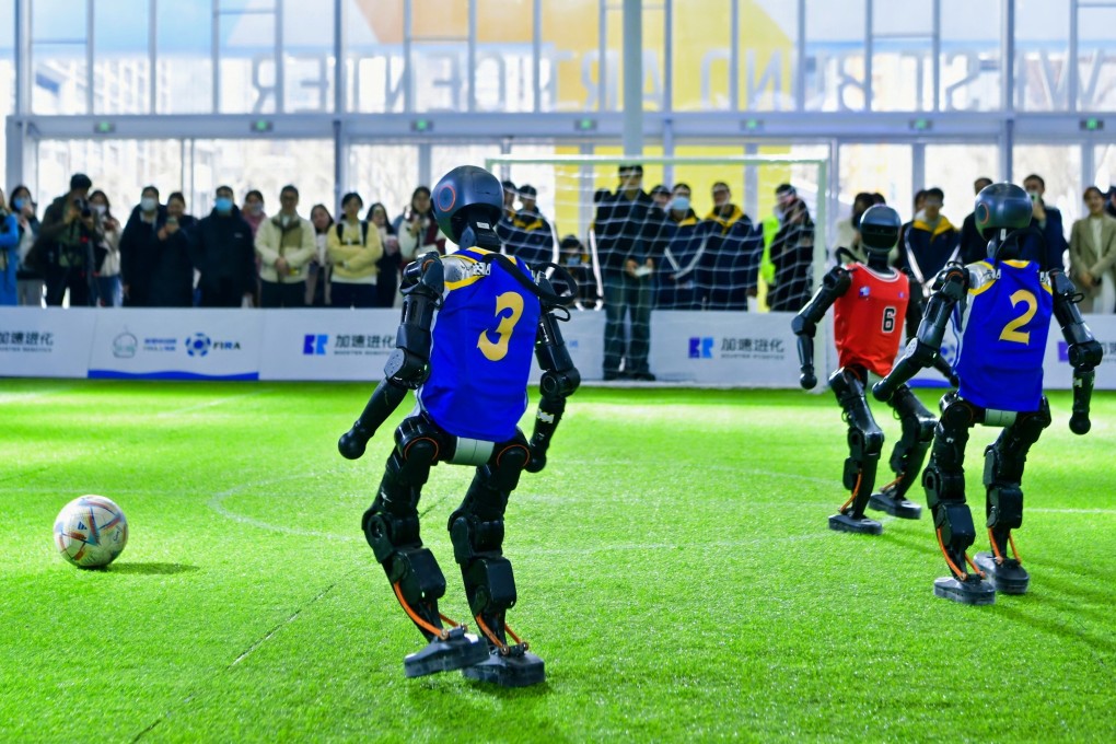 Humanoid robots play football at the Global Developer Conference, an AI event held in Shanghai. Photo: Handout