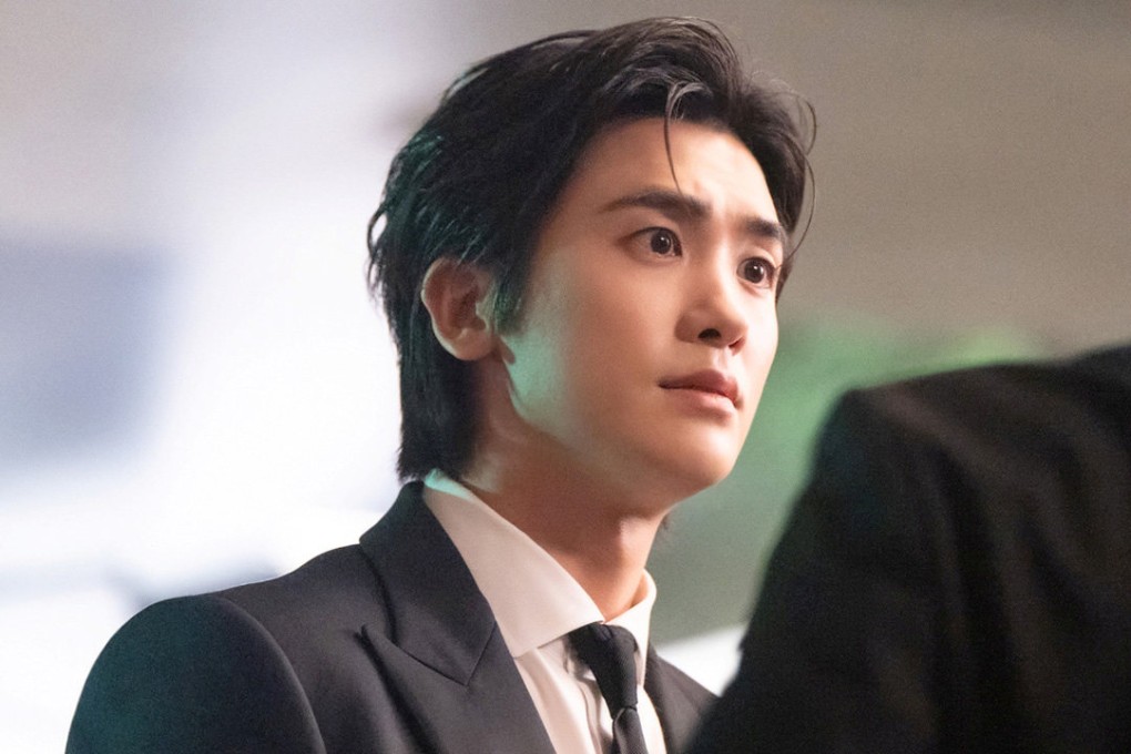 Park Hyung-sik as main character Seo Dong-ju in a still from Disney+ Korean drama series Buried Hearts. Dong is a corporate aide who sees his world fall apart when his private and working lives collide.