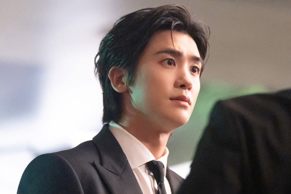 Park Hyung-sik as main character Seo Dong-ju in a still from Disney+ Korean drama series Buried Hearts. Dong is a corporate aide who sees his world fall apart when his private and working lives collide.