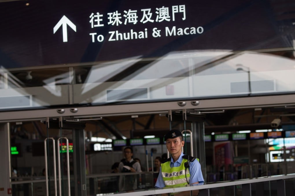 Signage in Hong Kong for passengers taking the bridge to Macau uses the spelling Macao, the same as that used on official documents everywhere ... except Portugal. Photo: EPA-EFE