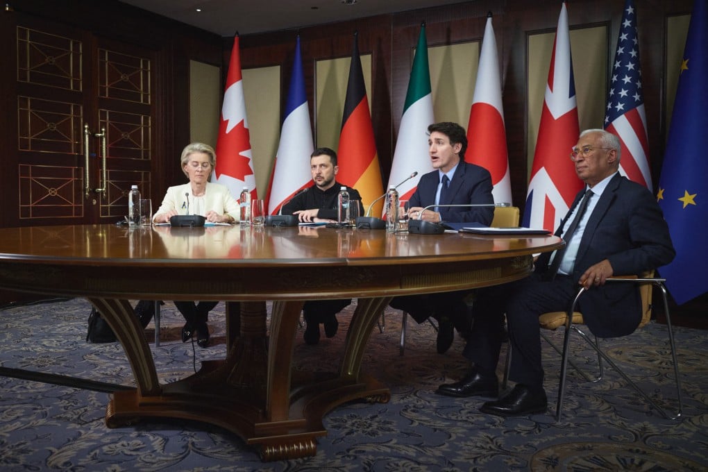 From left, European Commission President Ursula von der Leyen, Ukraine’s President Volodymyr Zelensky, Canada’s Prime Minister Justin Trudeau and European Council President Antonio Costa at a meeting of G7 leaders via video link in Kyiv, Ukraine on Monday. Photo: Ukrainian Presidential Press Service / AFP / Handout