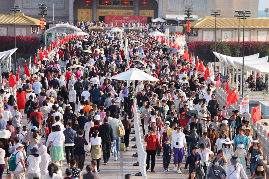 Tourists at the Nanshan Cultural Tourism Zone in Sanya, Hainan Province on Jauary 29, 2025. Photo: Xinhua