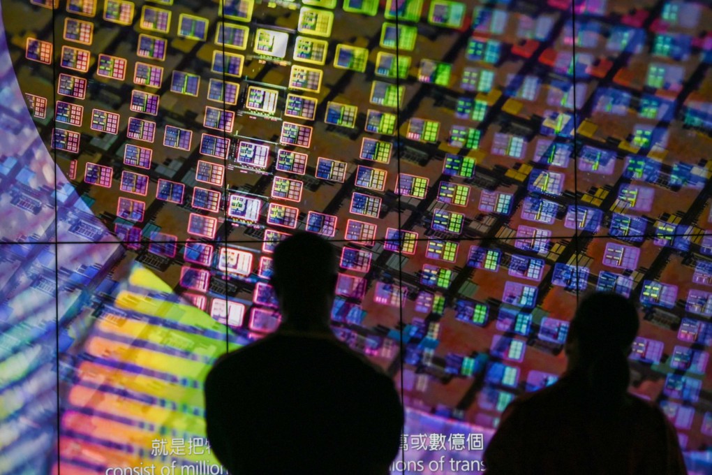 Visitors watch a screen showing silicon wafers at a Taiwan Semiconductor Manufacturing Company museum at the Hsinchu Science Park in Hsinchu, Taiwan, on July 5, 2023. Photo: AFP