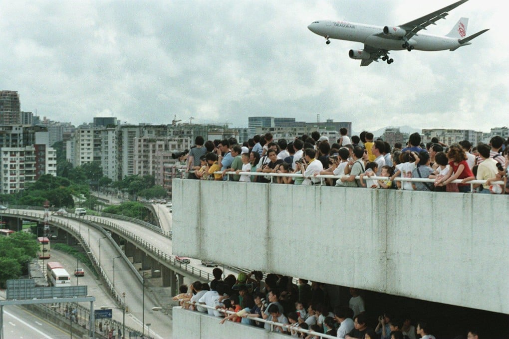People throng the terrace of a car park near Kai Tak in June 1998. Picture: SCMP