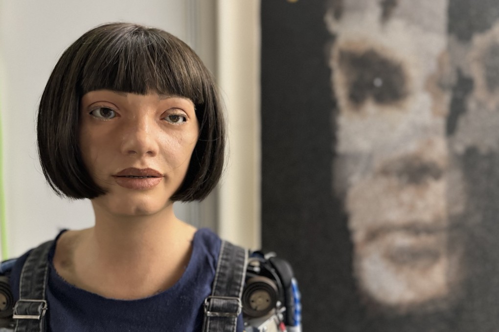 Robot Ai-Da and its creation, A.I. God, a portrait of Alan Turing, in this undated picture at the United Nations in Geneva, Switzerland. Major auction houses have been dabbling in AI art. Photo: EPA-EFE / Sotheby’s handout