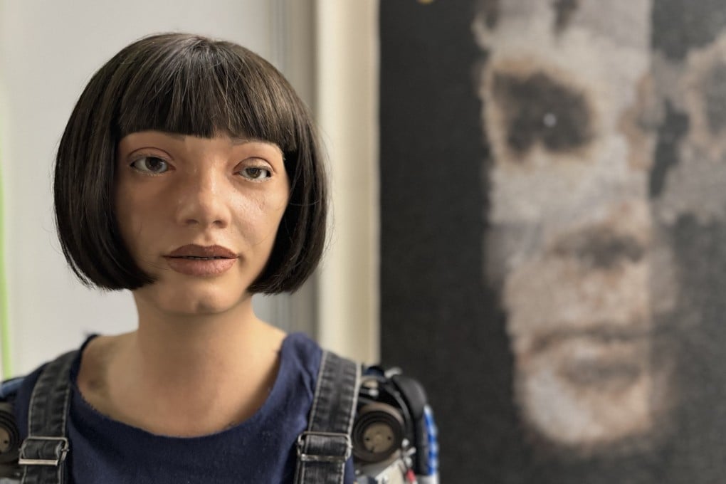 Robot Ai-Da and its creation, A.I. God, a portrait of Alan Turing, in this undated picture at the United Nations in Geneva, Switzerland. Major auction houses have been dabbling in AI art. Photo: EPA-EFE / Sotheby’s handout