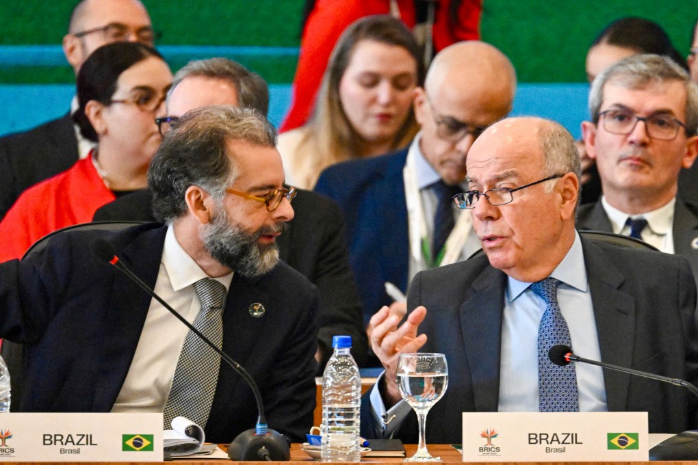 Brazilian Foreign Minister Mauro Vieira (right) and Brazilian representative Mauricio Lyrio talk during the Brics sherpa meeting in Brasilia on Tuesday. Vieira says “Brics must advocate for an open, fair and balanced multilateral trade system”. Photo: AFP