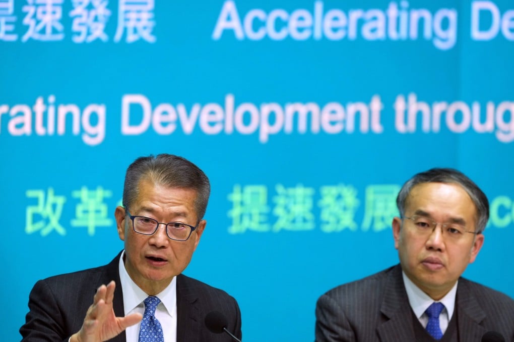 Financial Secretary Paul Chan (left) has set aside HK$1 billion for an AI research institute. Photo: SCMP