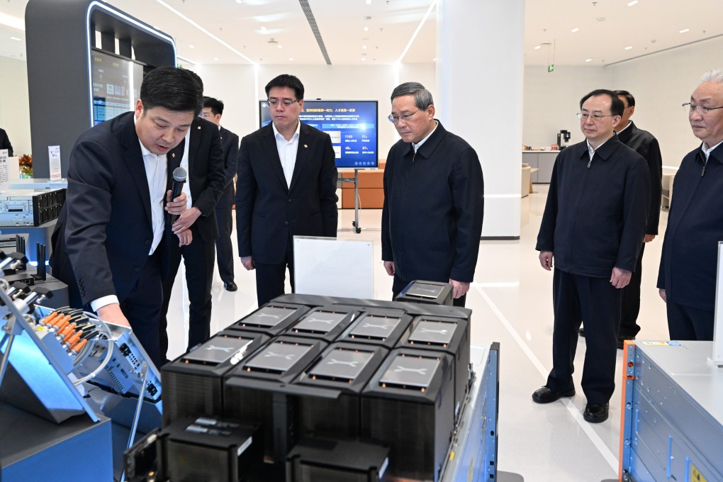 Premier Li Qiang visits a company owned by China Unicom on Tuesday. Photo: Xinhua