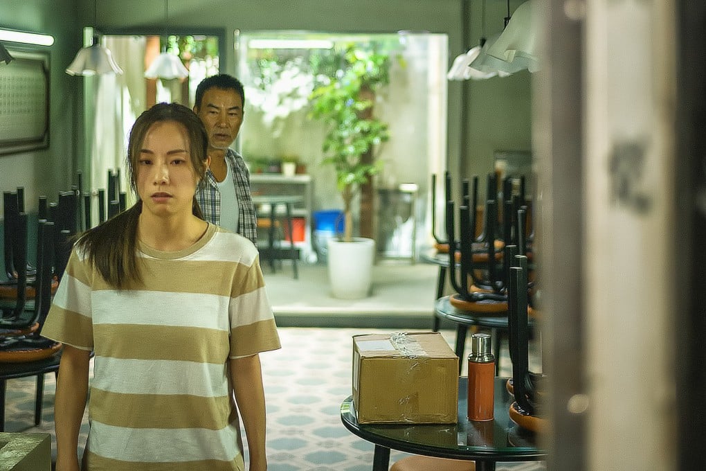 Stephy Tang and Simon Yam in a still from Little Red Sweet (category I, Cantonese). Directed by Vincent Chow, it co-stars Jeffrey Ngai.