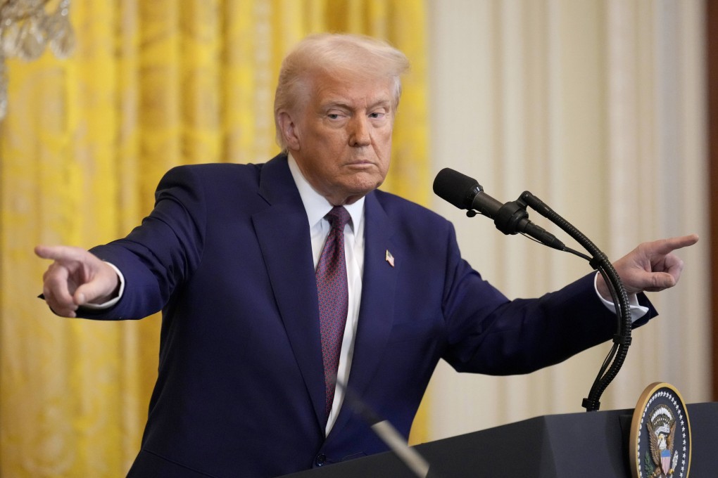US President Donald Trump points during a news conference at the White House on February 13. Photo: AP