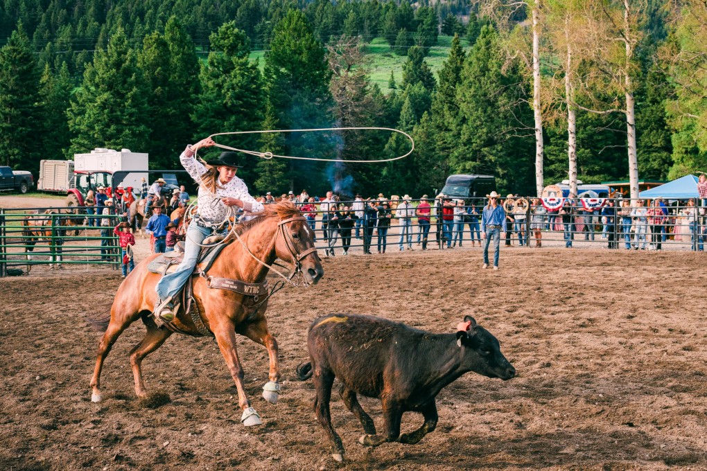 A rider competes in calf roping during a rodeo. Photo: Courtesy of Lone Mountain Ranch