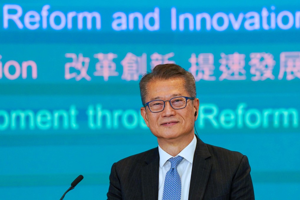 Financial Secretary Paul Chan at a joint radio phone-in programme. Photo: Elson Li
