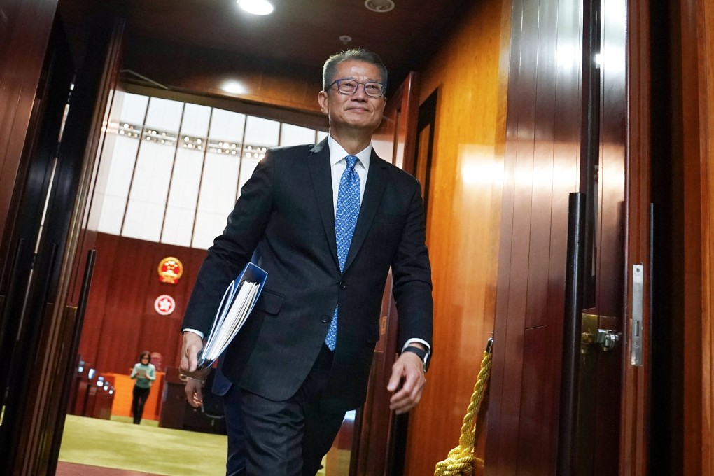 Financial Secretary Paul Chan leaves the chamber after delivering his budget speech. Photo: Elson Li