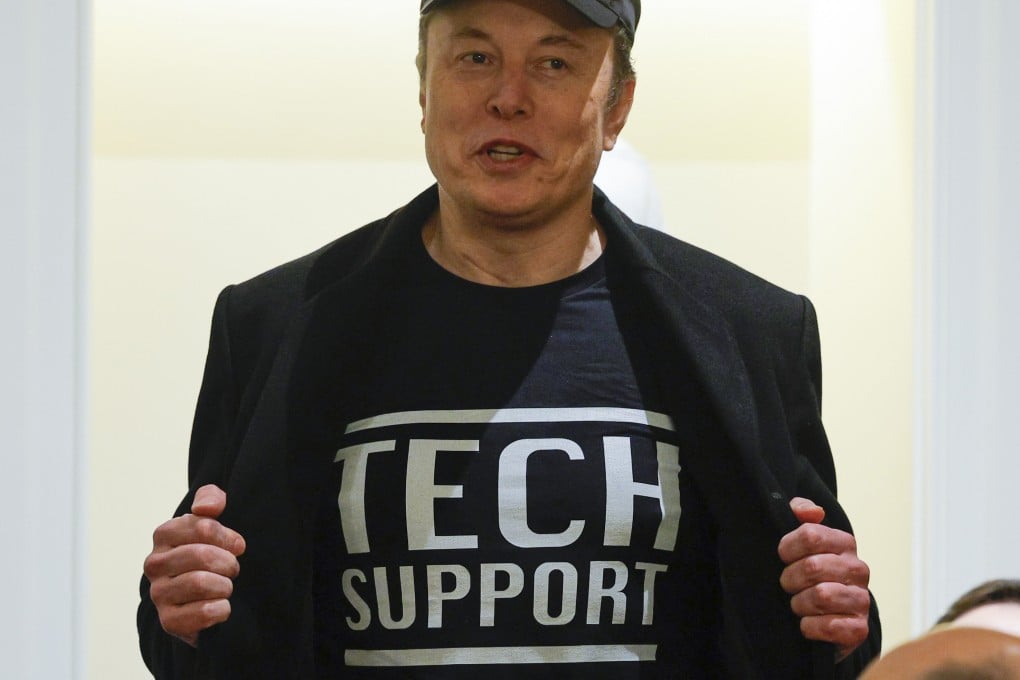 Elon Musk reveals his “tech support” T-shirt at a cabinet meeting with US President Donald Trump in Washington on Wednesday. Photo: AP