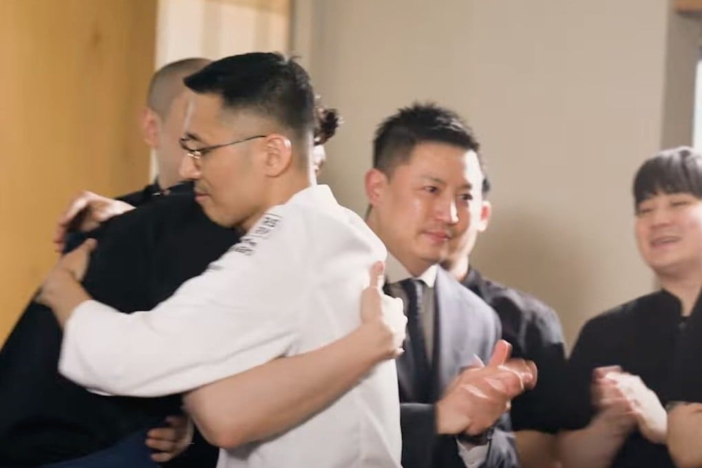 Chef Kang Min-goo receives congratulations after learning that his restaurant Mingles has been awarded a third Michelin star in the Michelin Guide Seoul & Busan 2025. It is the only restaurant in South Korea with three Michelin stars. Photo: YouTube/Michelin Guide Asia