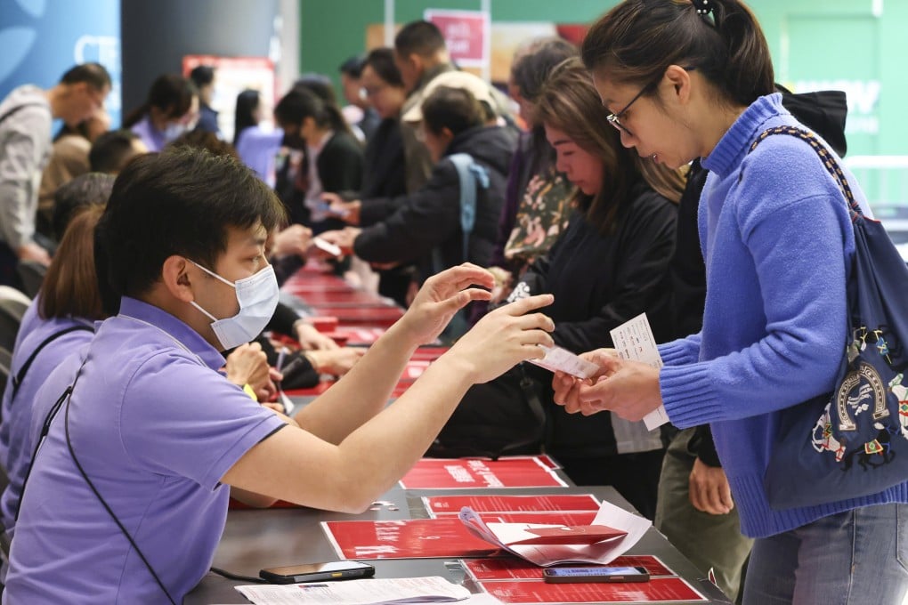 People collect their tickets for the opening ceremony of Kai Tak Sports Park. Photo: Dickson Lee