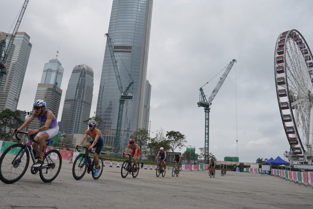 Triathletes vie for places during the cycling leg of the National Games test event on Saturday. Photo: Elson Li