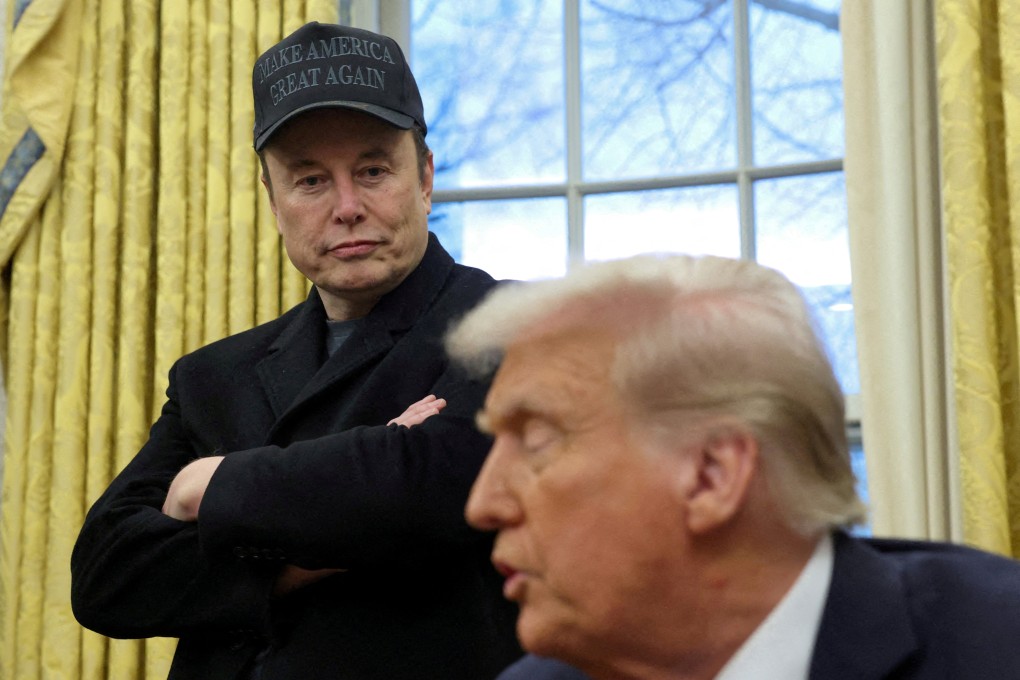 Elon Musk listens to US President Donald Trump speak in the Oval Office of the White House in Washington on February 11. Photo: Reuters