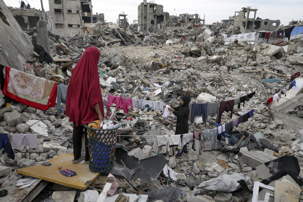 The Nijim family hangs laundry on the ruins of their property amid widespread destruction by the Israeli military, in Jabalia, Gaza Strip, on Febuary 18. Photo: AP