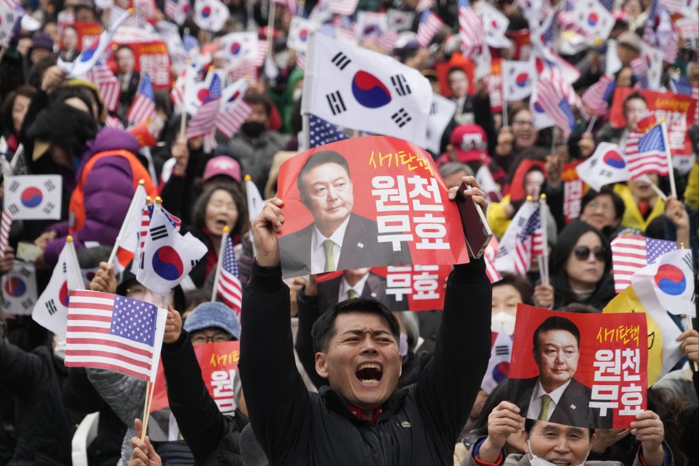 A supporter of impeached South Korean President Yoon shouts during a rally opposing his impeachment, in Seoul on Saturday. Photo: AP