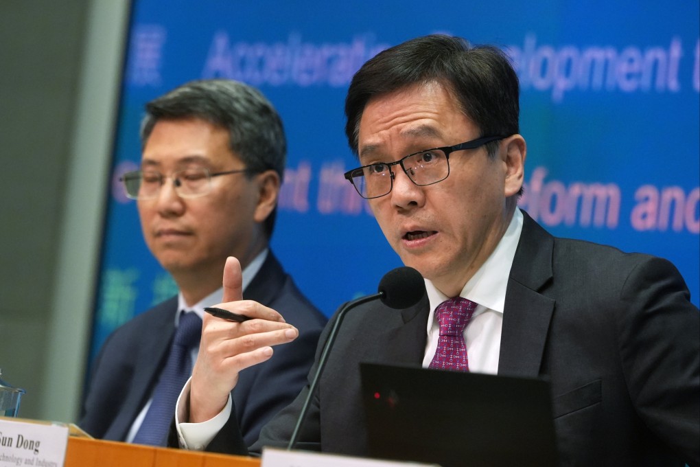 Sun Dong (right), with Eddie Mak Tak-wai, the bureau’s permanent secretary, says it is essential for Hong Kong to have its own “star enterprises”. Photo: Sun Yeung