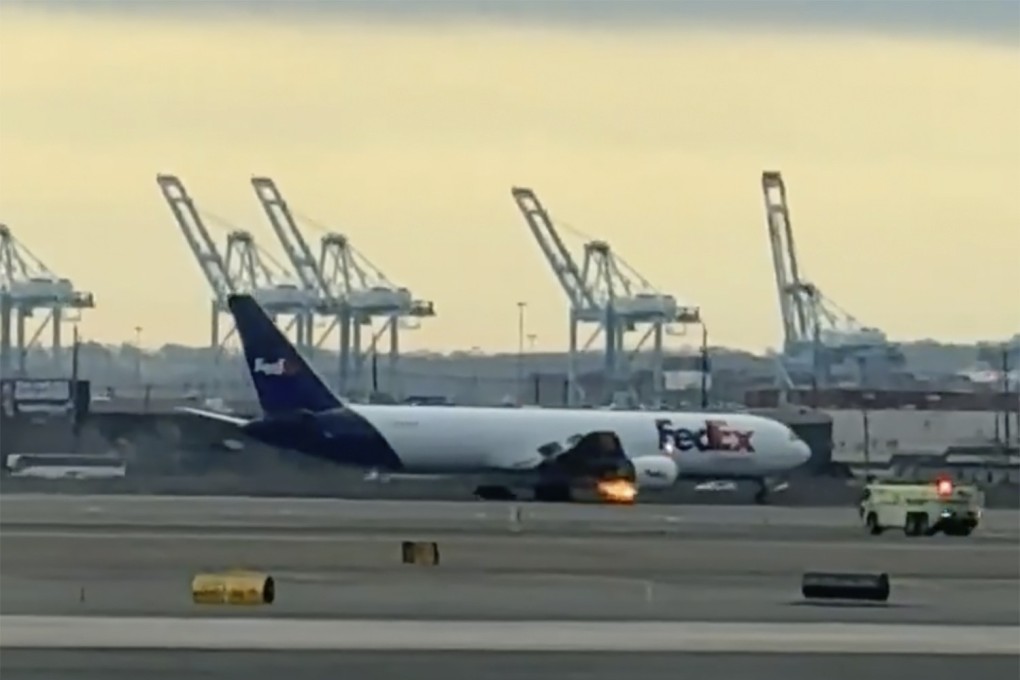 A FedEx cargo plane makes an emergency landing at Newark Liberty International Airport in New Jersey on Saturday. Photo: Kenneth Hoffman via AP