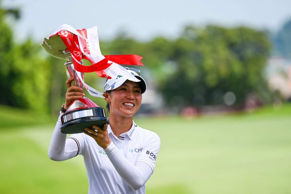 Lydia Ko with the trophy after winning the HSBC Women’s World Championship in Singapore. Photo: AFP