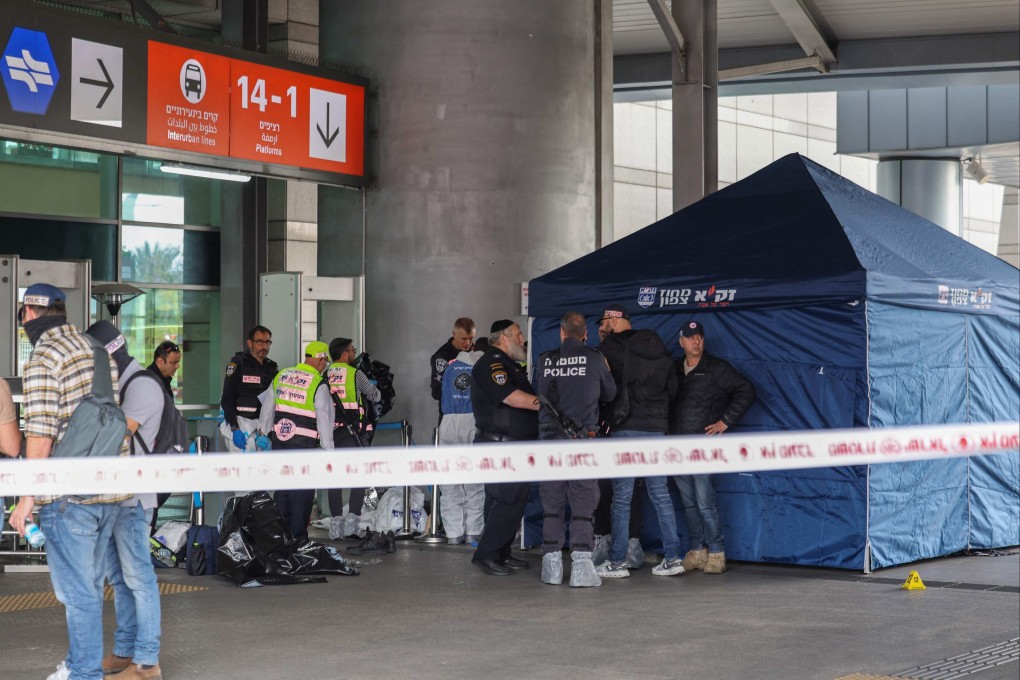 Members of Israeli security and emergency services at the site of a stabbing attack at a central bus station in Haifa. Photo: AFP