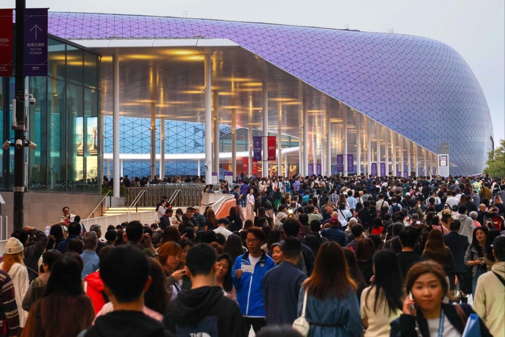 Spectators make their way to Kai Tak Stadium for the opening ceremony on Saturday. Photo: Dickson Lee