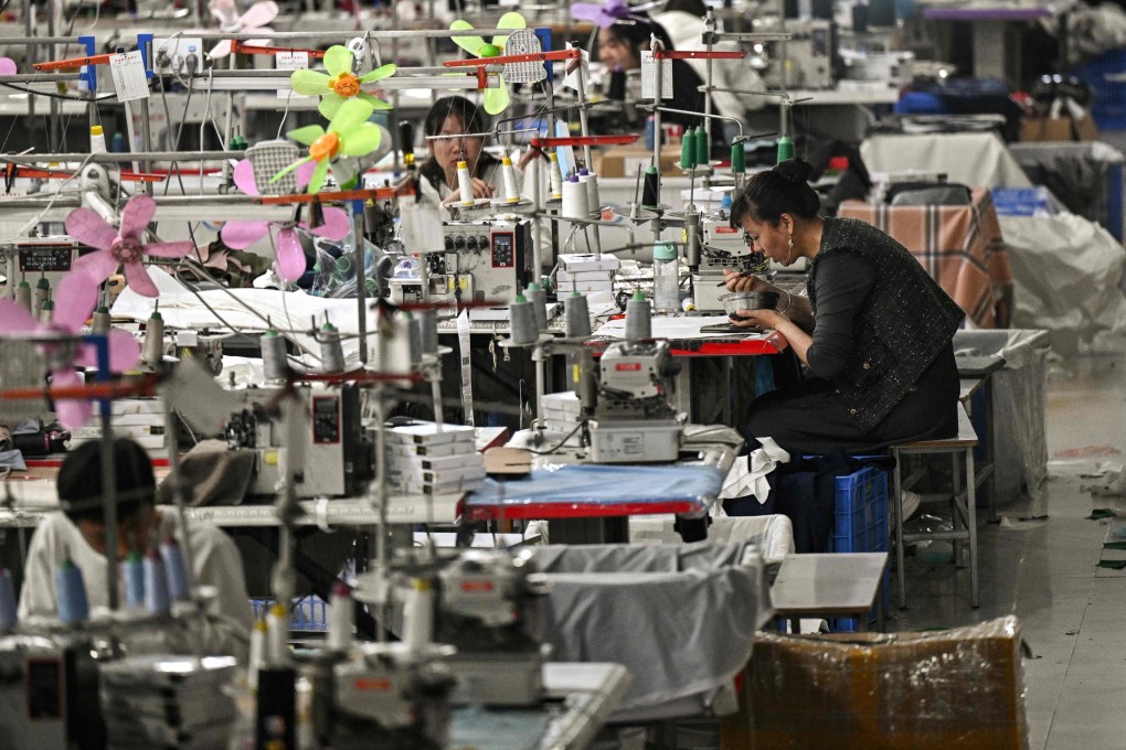 Additional US tariffs on Chinese products would deal a blow to China’s exporters, such as this garment factory in Guangzhou. Photo: AFP