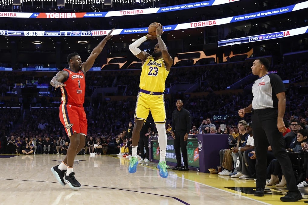 The Los Angeles Lakers’ LeBron James (right) shoots a three-point basket against the New Orleans Pelicans to reach 50,002 NBA regular-season and playoff career points at Crypto.com Arena on Tuesday. Photo: TNS