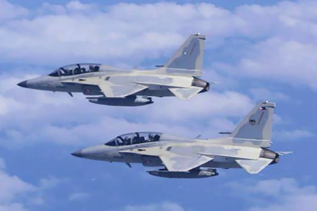 Two Philippine Air Force FA-50 fighter jets fly in formation during a joint patrol and training session with the US over the South China Sea on Tuesday. Photo: Philippine Air Force via AP