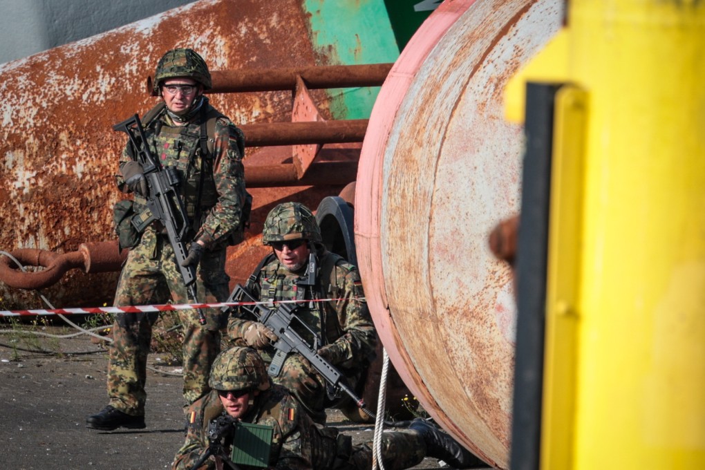 German Homeland Security soldiers during a simulated enemy attack. Photo: dpa