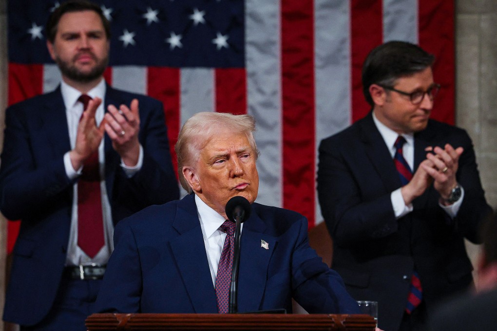 US President Donald Trump addresses a joint session of Congress at the US Capitol in Washington on March 4. US Vice-President J.D. Vance and Speaker of the House Mike Johnson applaud behind him. Photo: Getty Image/ AFP