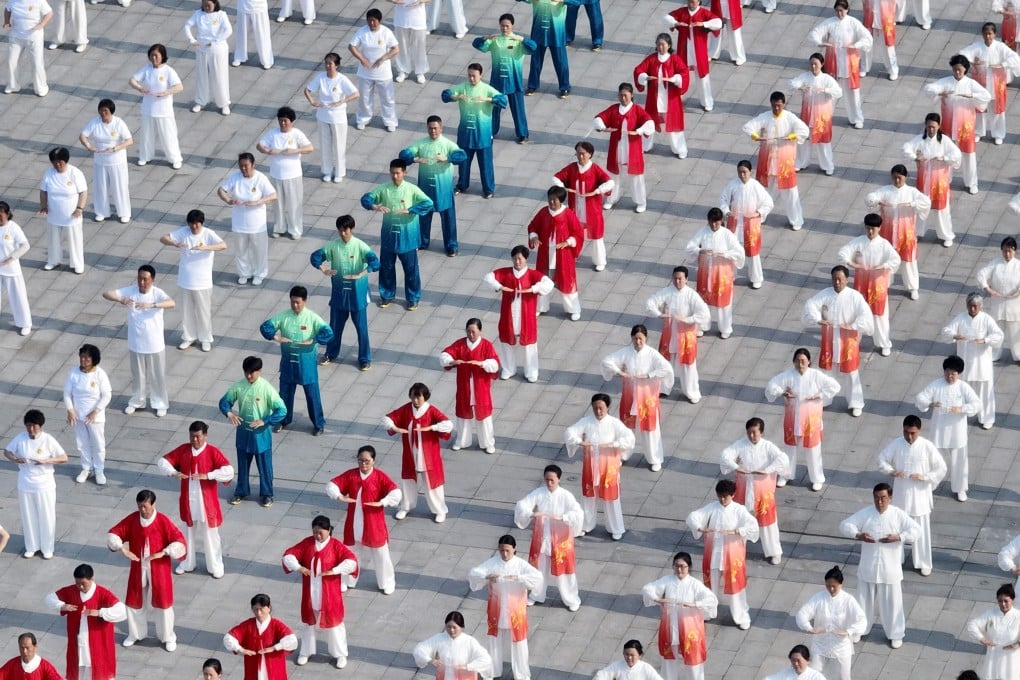 A mass qigong session in Jiangsu, China. Qigong is to Chinese traditional medicine what yoga is to traditional Indian medicine, or Ayurveda. Photo: Xinhua