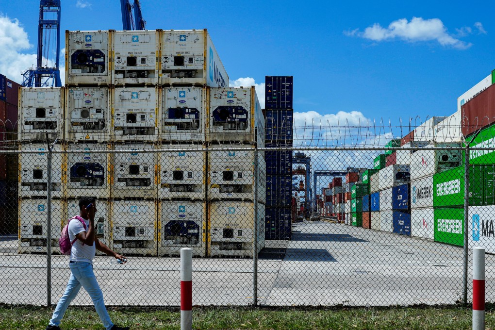 A man walks near the entrance of the Balboa Port after Hong Kong’s CK Hutchison Holdings agreed to sell its interests in a key Panama Canal port operator. Photo: Reuters