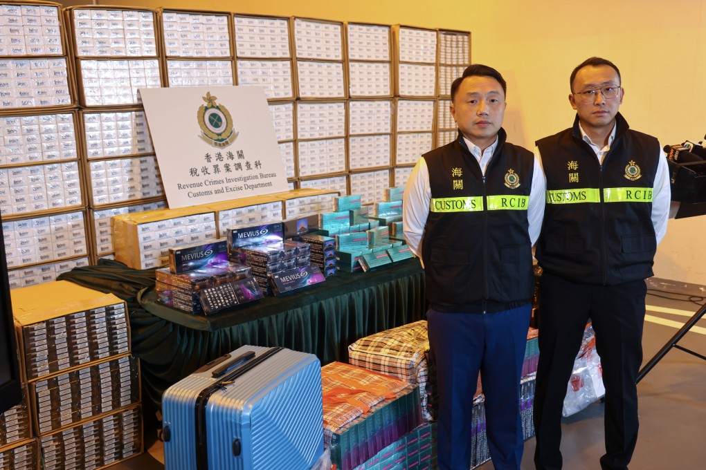 Customs officers Chan Sing-lung (left) and Wong Wing-yuen with the seized goods. Photo: Dickson Lee