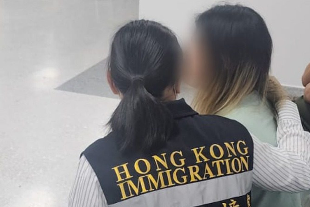 A task force member (left) with one of the rescued Hong Kong residents. Photo: Handout