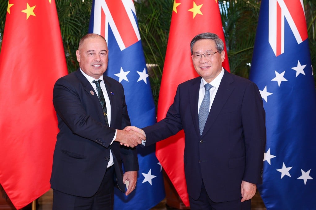 Chinese Premier Li Qiang with Cook Islands Prime Minister Mark Brown (left) in Harbin, China, on February 14. Photo: Xinhua