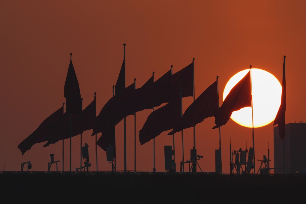 The sun rises over Tiananmen Square ahead of the opening session of China’s annual legislative meetings, in Beijing on Wednesday. Photo: AP