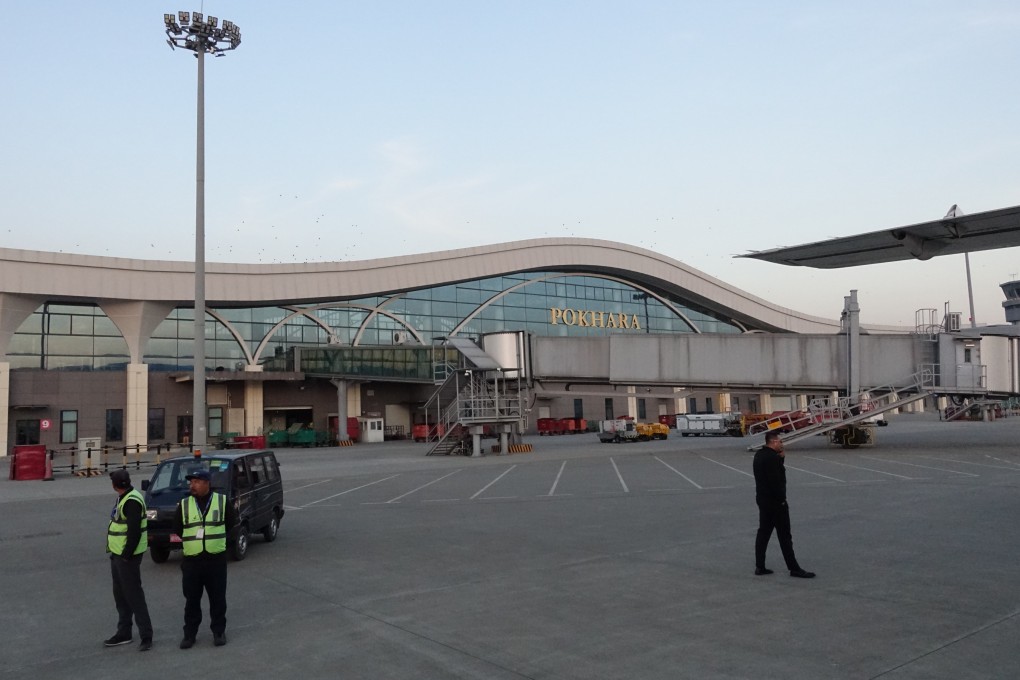 Staff members wait for the arrival of passengers at Pokhara International Airport on December 18, 2024 in Pokhara, Nepal. Photo: China News Service via Getty Images